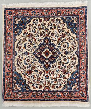 An old rug from Sarouk. Around 76 x 68 cm.