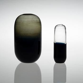 TIMO SARPANEVA, A SET OF TWO GLASS SCULPTURES, 3598, Signed Timo Sarpaneva, Iittala -57. The smaller one is unsigned.