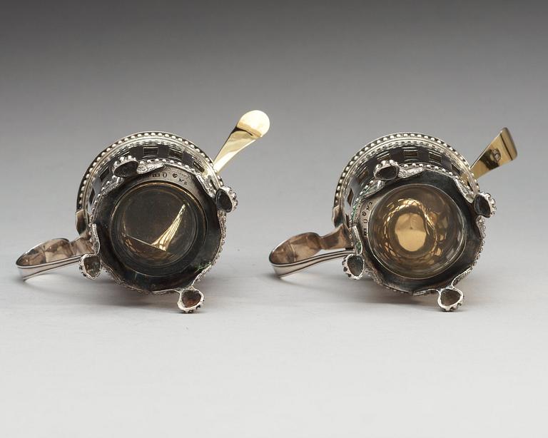 A pair of Swedish 18th century silver mustard-pots and spoons, makers mark of Simson Ryberg, Stockholm 1794.
