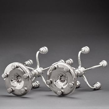 Georg Jensen, a pair of 830/1000 silver five light candelabra, Copenhagen 1920, design nr 200.