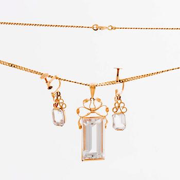 STIGBERT chainn and pendant and earrings, 18l gold and rock crystal.