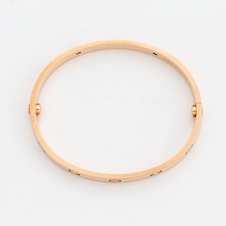 Cartier armband "Love" 18K roséguld med fyra runda briljantslipade diamanter.
