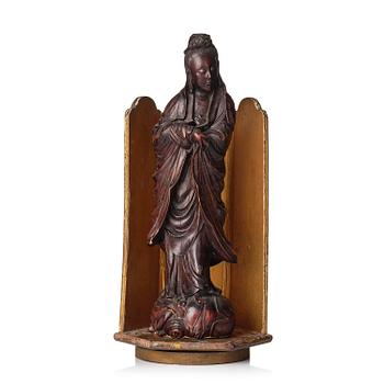 1030. A wooden sculpture of Guanyin with metal inlay, Qing dynasty.