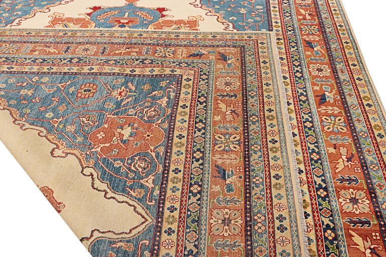 A Kazak carpet, c. 402 x 297 cm.
