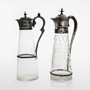 Two wine pitches, around 1900.