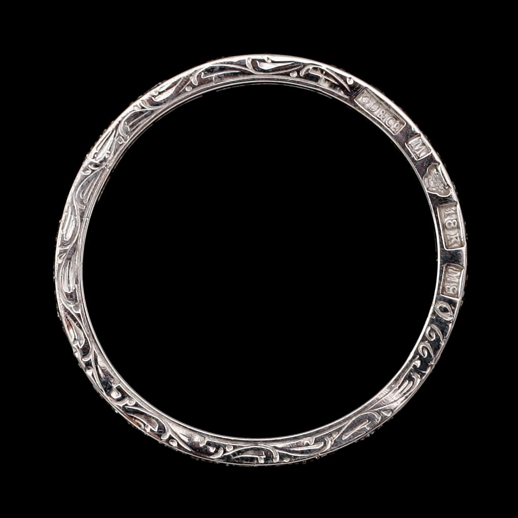 ALLIANSRING, 18 k vitguld, briljantslipade diamanter tot ca 0.66 ct.