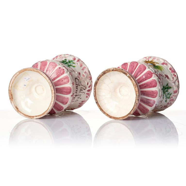 A pair of faiance historismus pharmacy jars with covers, 19th century.