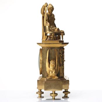 A Empire early 19th century gilt bronze mantel clock.