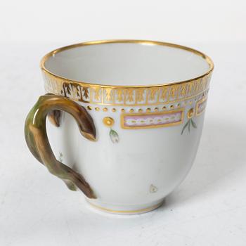 A Royal Copenhagen 'Flora Danica' coffee cup with stand, Denmark, 20th Century.