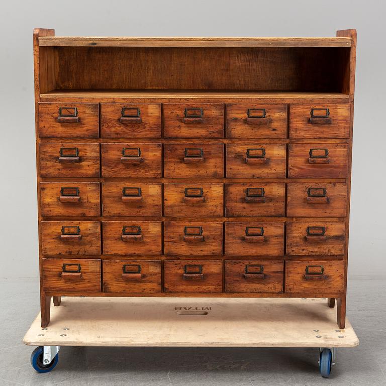 A circa 1900 chest of 20 drawers.