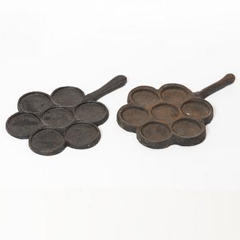 Two Swedish cast iron pancake irons, 18th / 19th century.