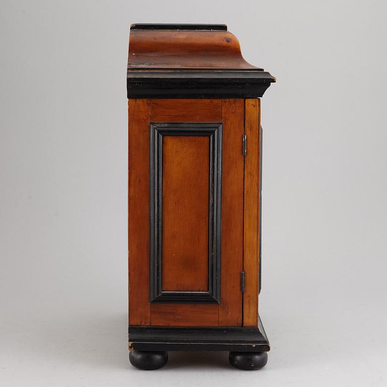 A barocque style spice cabinet, late 19th Century.