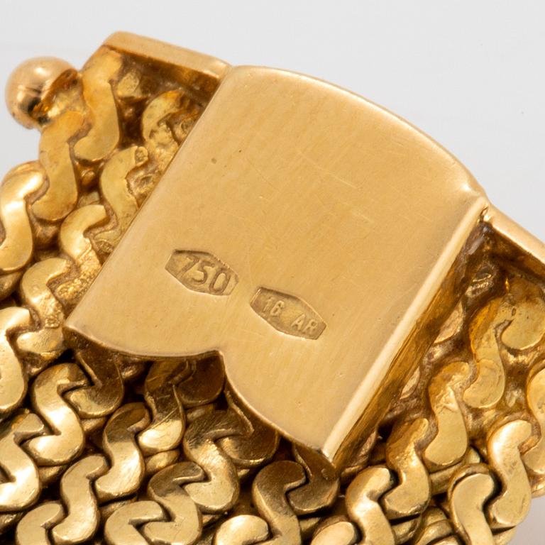 Armband 18K guld med kvarts-kattöga.