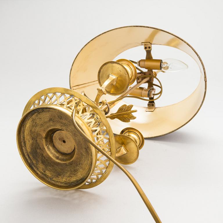 A gilt bronze bouillotte lamp for three candles, first half of the 20th century.