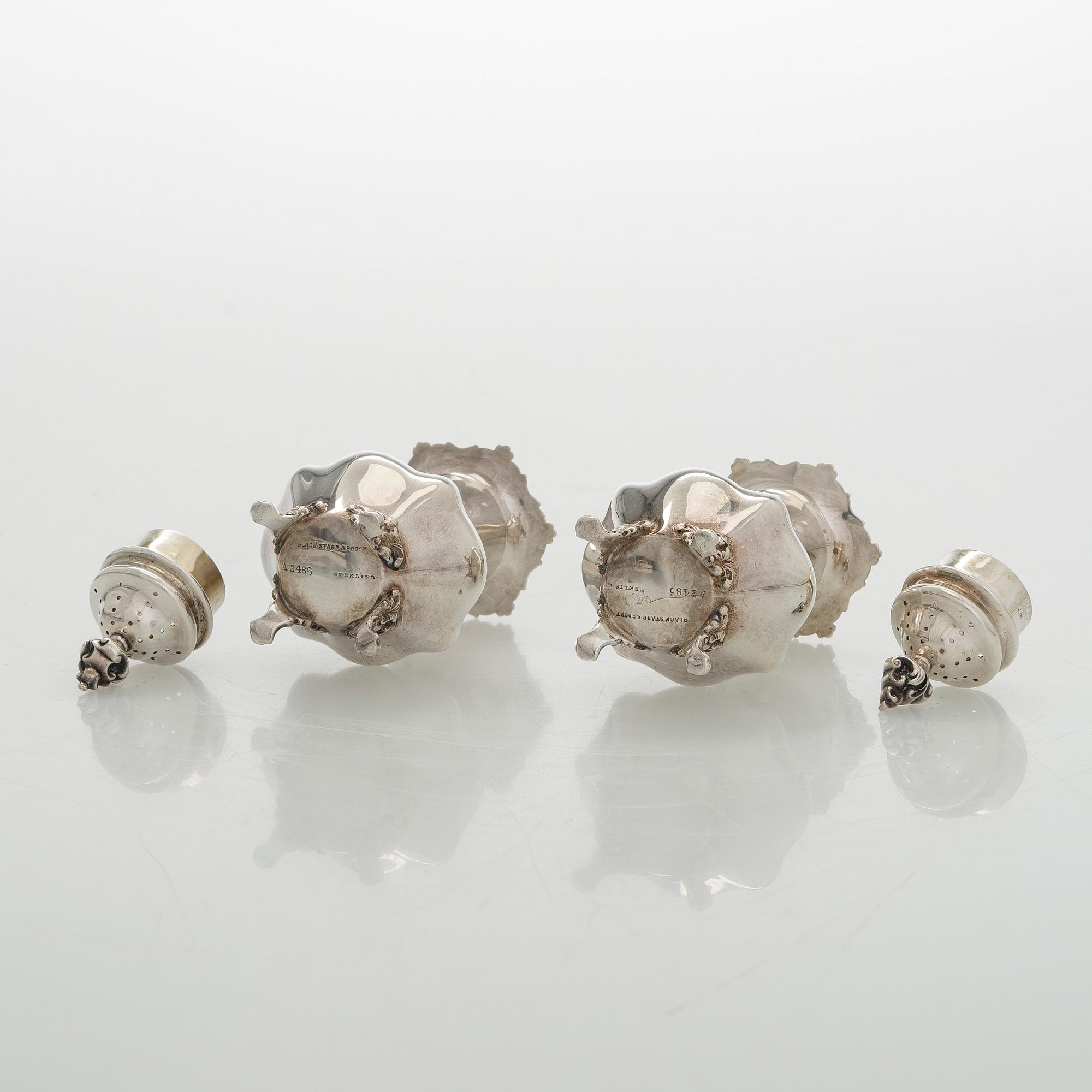 Black Starr & Frost, a pair of sterling silver shakers and sugar bowls, USA around 1900, Gorham pair of sterling spoons.