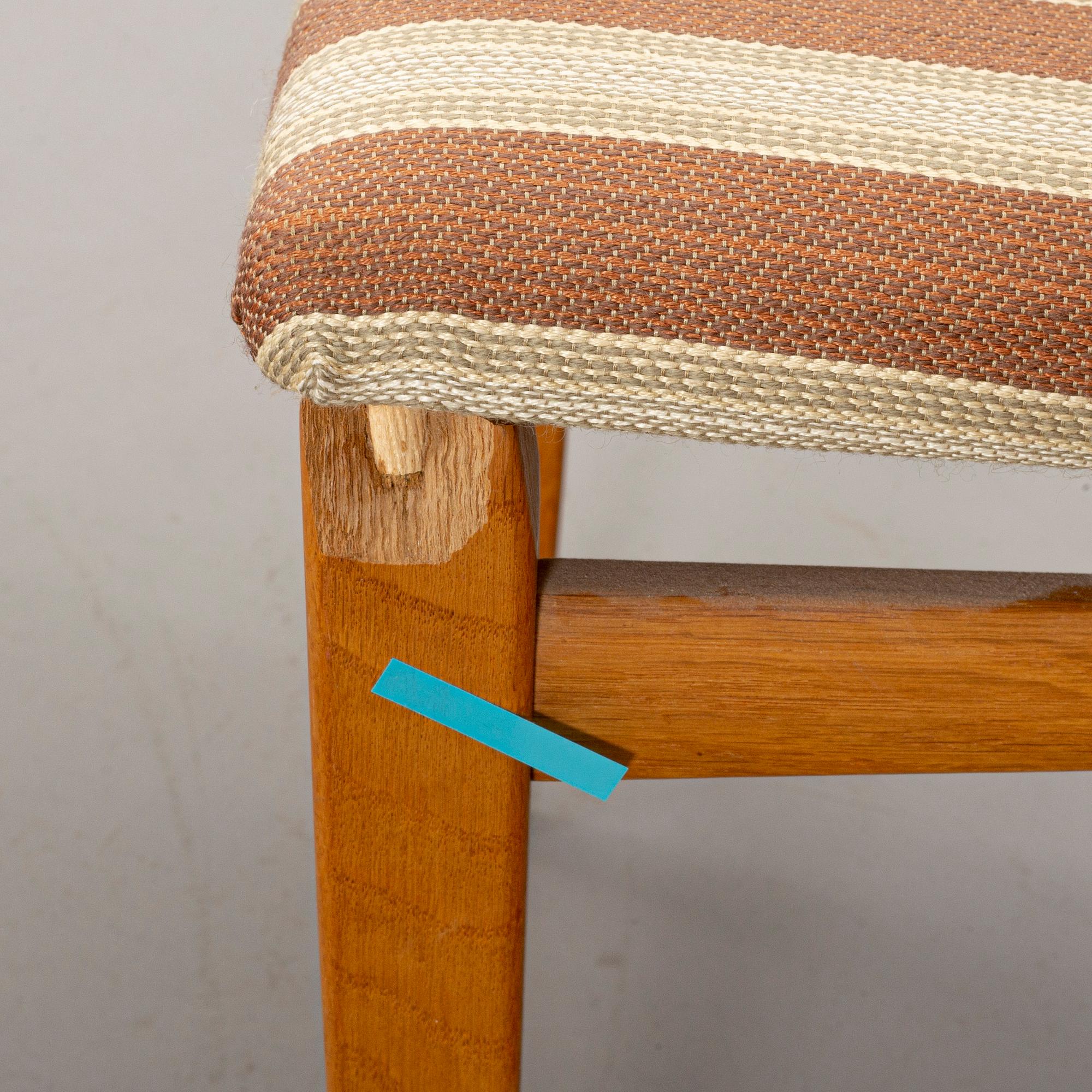 A CARL MALMSTEN DINING TABLE and CHAIRS, 7 parts.