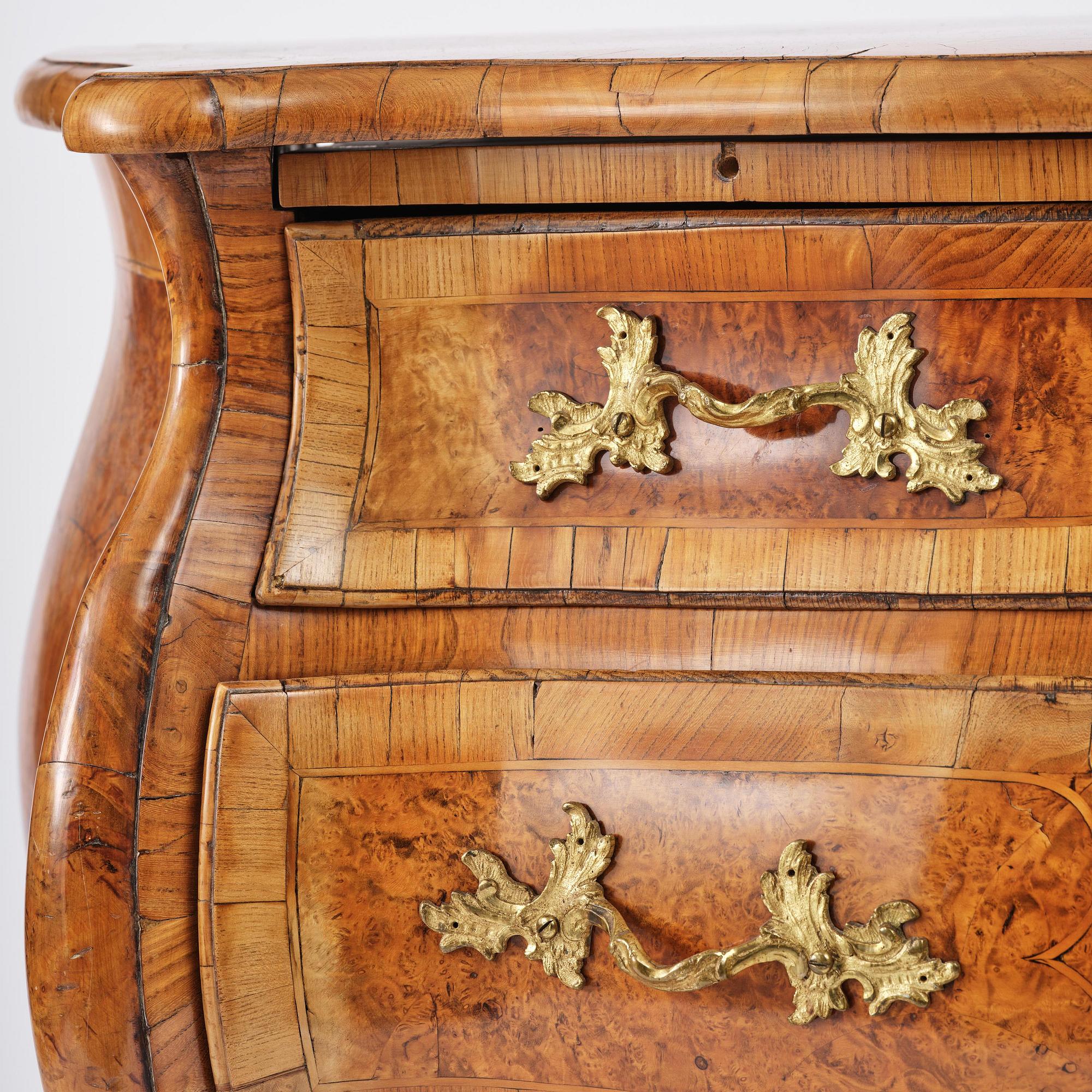 A burr alder parquetry rococo commode, Mälardalen, Sweden, later part 18th century.