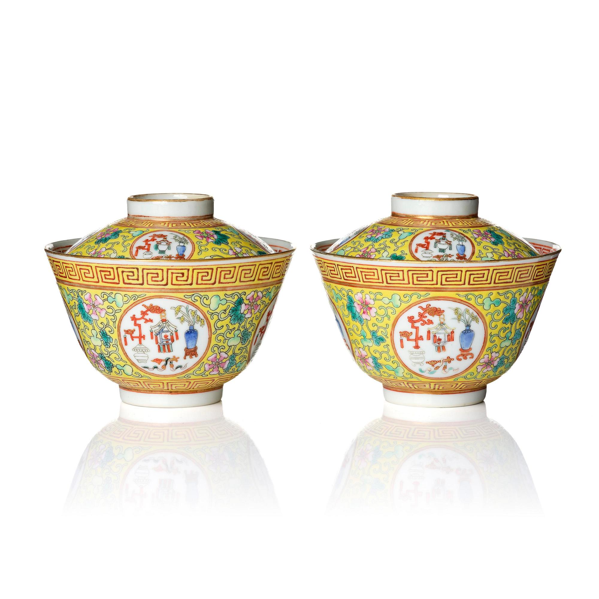 A pair of yellow ground 'medallion' bowls with covers, Qing dynasty with Daoguang mark.