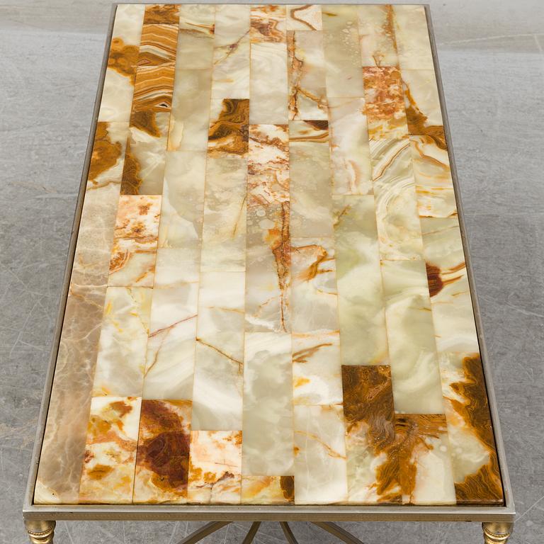 a metal and onyx coffee table from the mid 20th century.