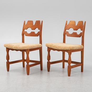 Henning Kjærnulf, a set of six oak 'Razorblade' chairs with new sheepskin upholstery, Nyrups, Denmark, 1960s.