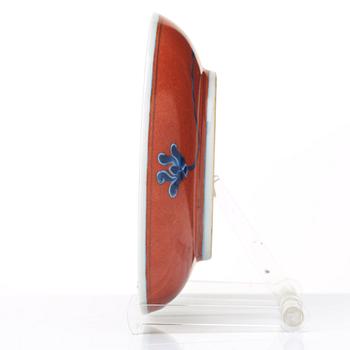 A red glazed dish, 17th Century with Chenghua mark.