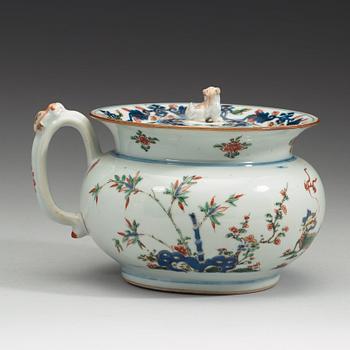A porcelain chamber pot and cover, Qing dynasty, early 18th Century.