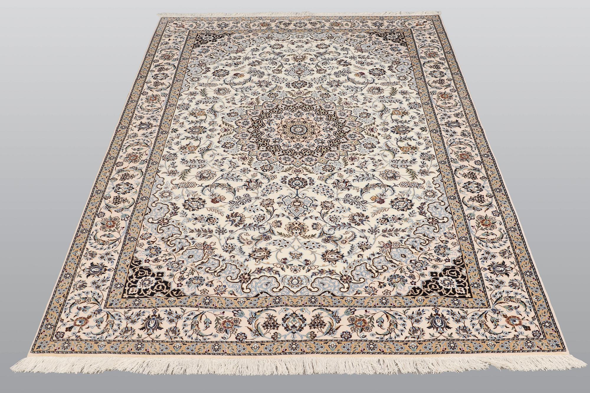 A carpet, Nain part silk so called 6 LAA, signed, ca 240 x 137 cm.