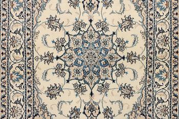 A Nain part silk rug, c. 193 x 148 cm.