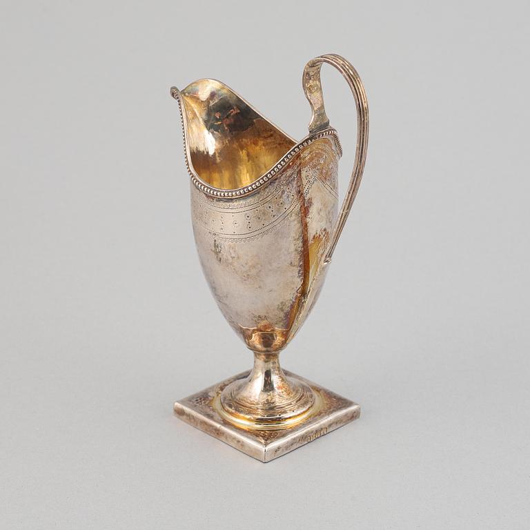 A silver creamer, indistinct makers mark, London, 1791.