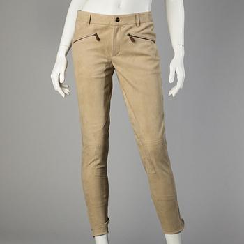 A beige suede pants by Ralph Lauren.