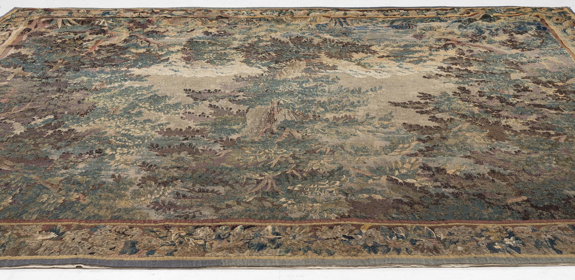 A flemish 'verdur' tapestry, c. 282 x 321 cm, 18 th century.