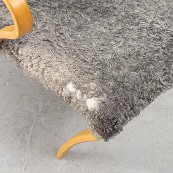 Bruno Mathsson, a 'Miranda' armchair and ottoman, Bruno Mathsson International, Värnamo, 2001.