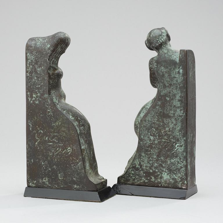 A pair of Axel Gute patinated metal bookends, Sweden 1919.