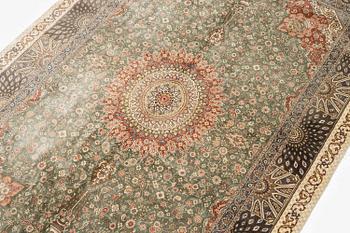 A silk Qum, Central Persia. signed Mohammad Gamshidi, c. 203 x 126 cm.