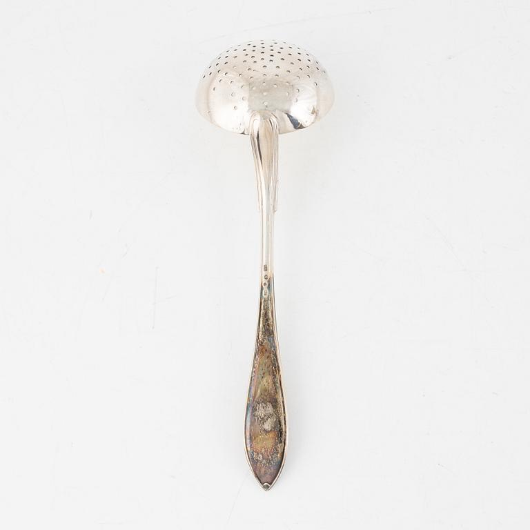 A Swedish silver sugarbowl and a spoon, mark of Svea Svensson, Stockholm 1909.
