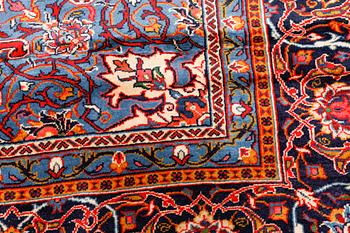 A Sarouk rug, 394 x 295 cm.