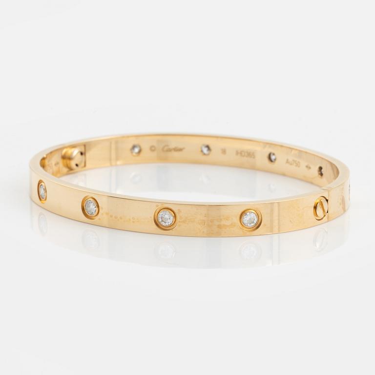 Cartier "Love" armband 18K guld med tio runda briljantslipade diamanter.