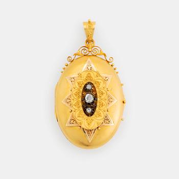 An 18K gold locket set with rose-cut diamonds.