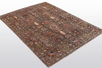A rug, Zieglar design, ca 244 x 180 cm.