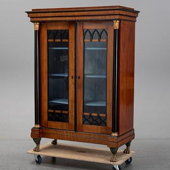 An Empire mahogany cabinet, first half of the 19th Century.
