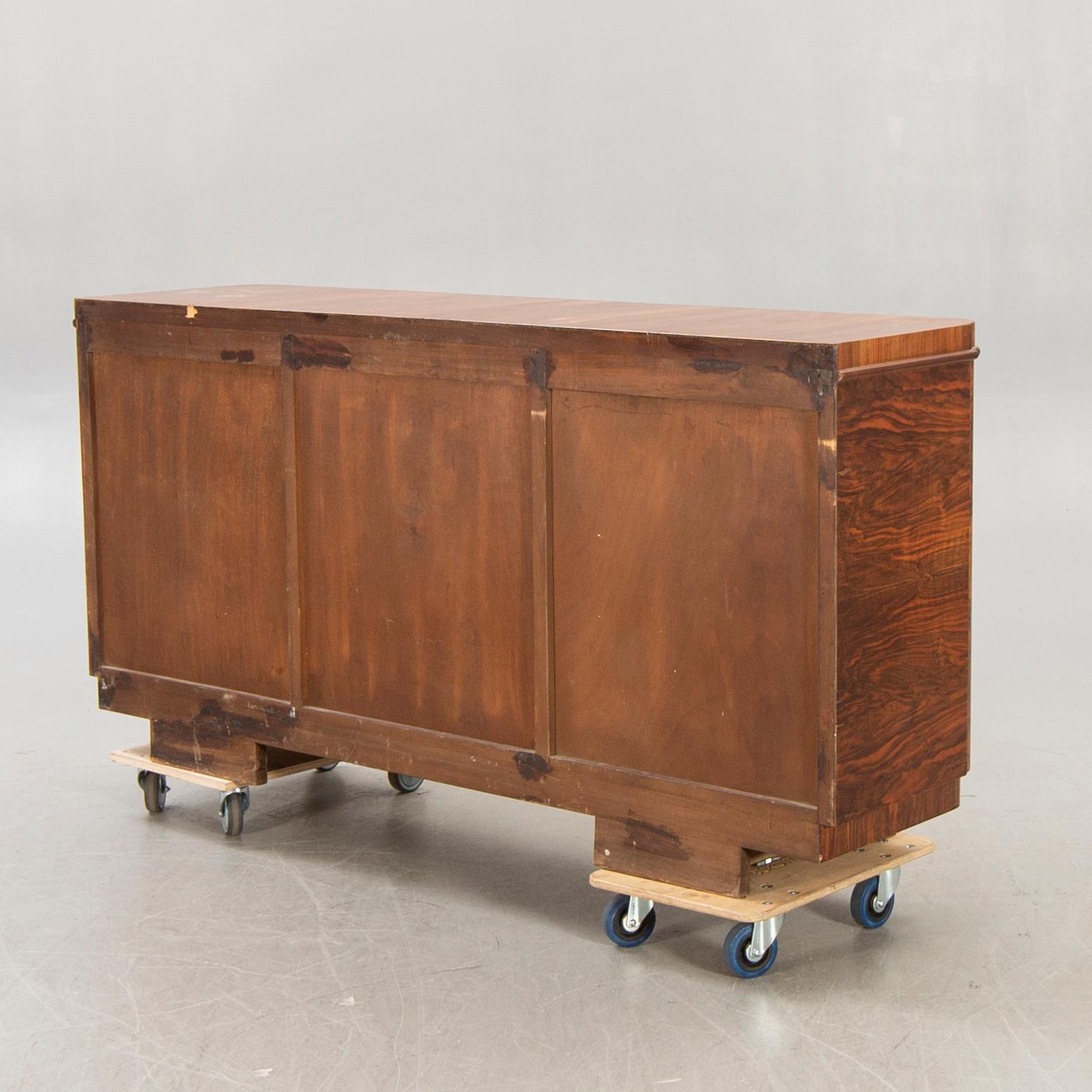 A walnut Art Deco 1940s sideboard.