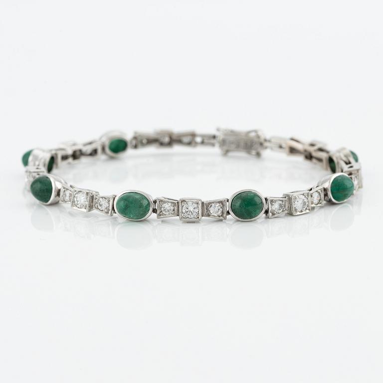 Bracelet, 18K white gold with cabochon-cut emeralds and brilliant-cut diamonds.