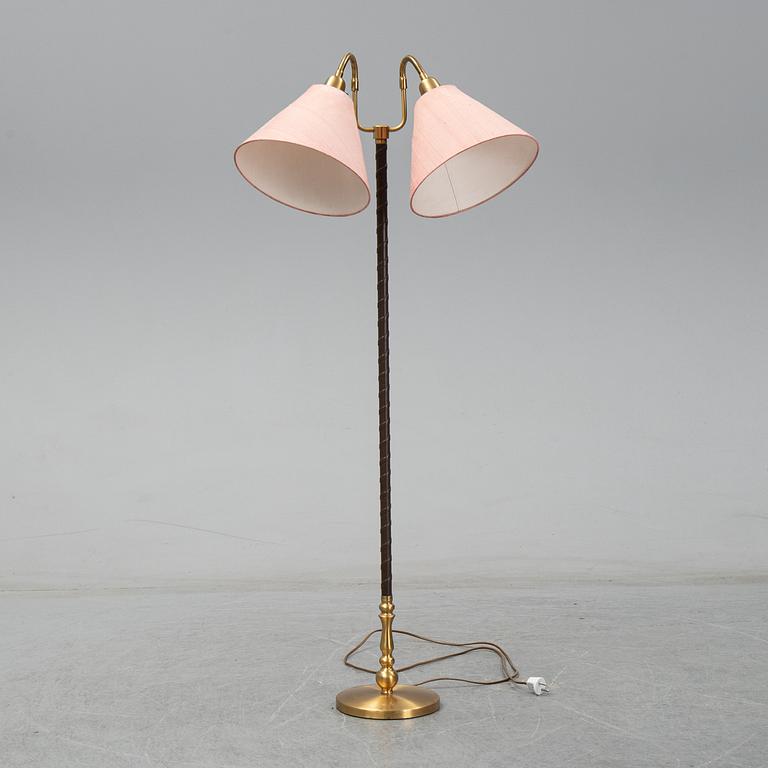 Einar Bäckstöm, a brass floor light, second half of the 20th Century.