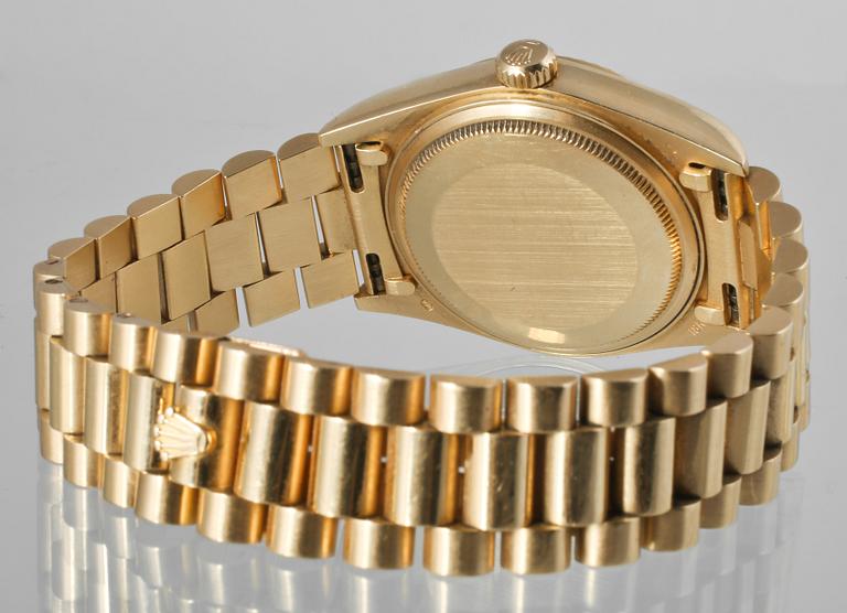 ARMBANDSUR, herr, 18 k guld, "Day-date", Rolex. Total vikt ca  140 g.