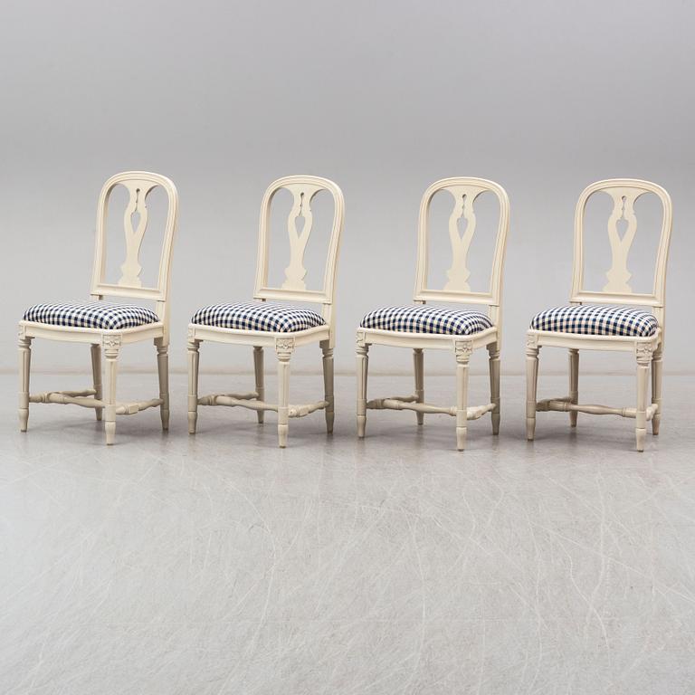 Four Swedish Gustavian style 'Hallunda' dining chairs from IKEA's 18th century collection.