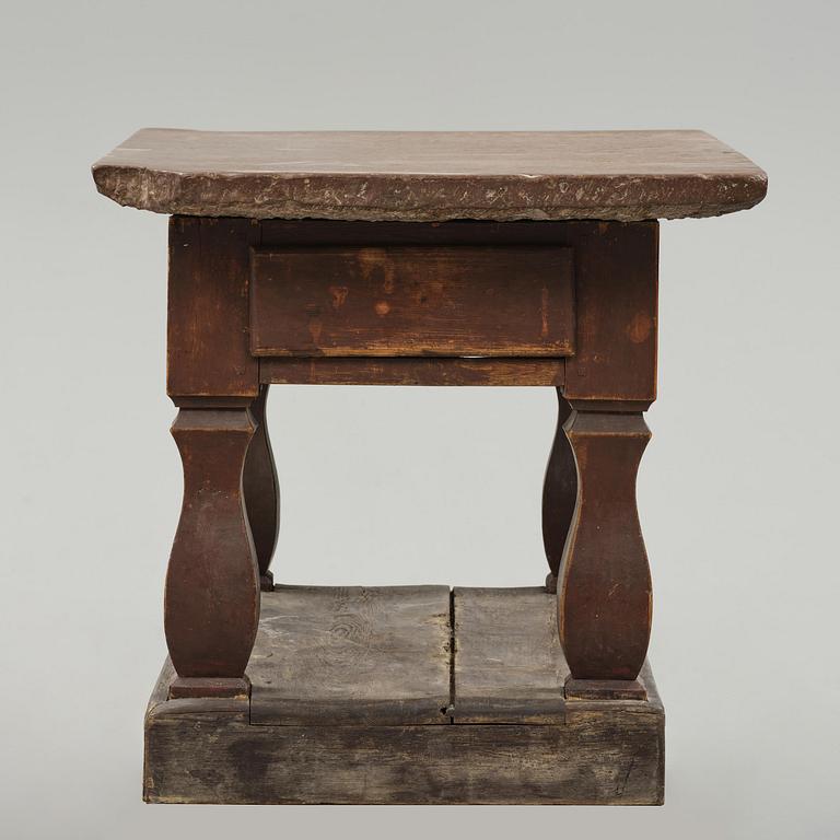 A Swedish baroque stone-top table, 18th century.