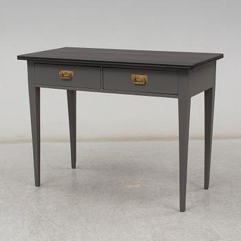 a writing desk from the first half of the 20th century.