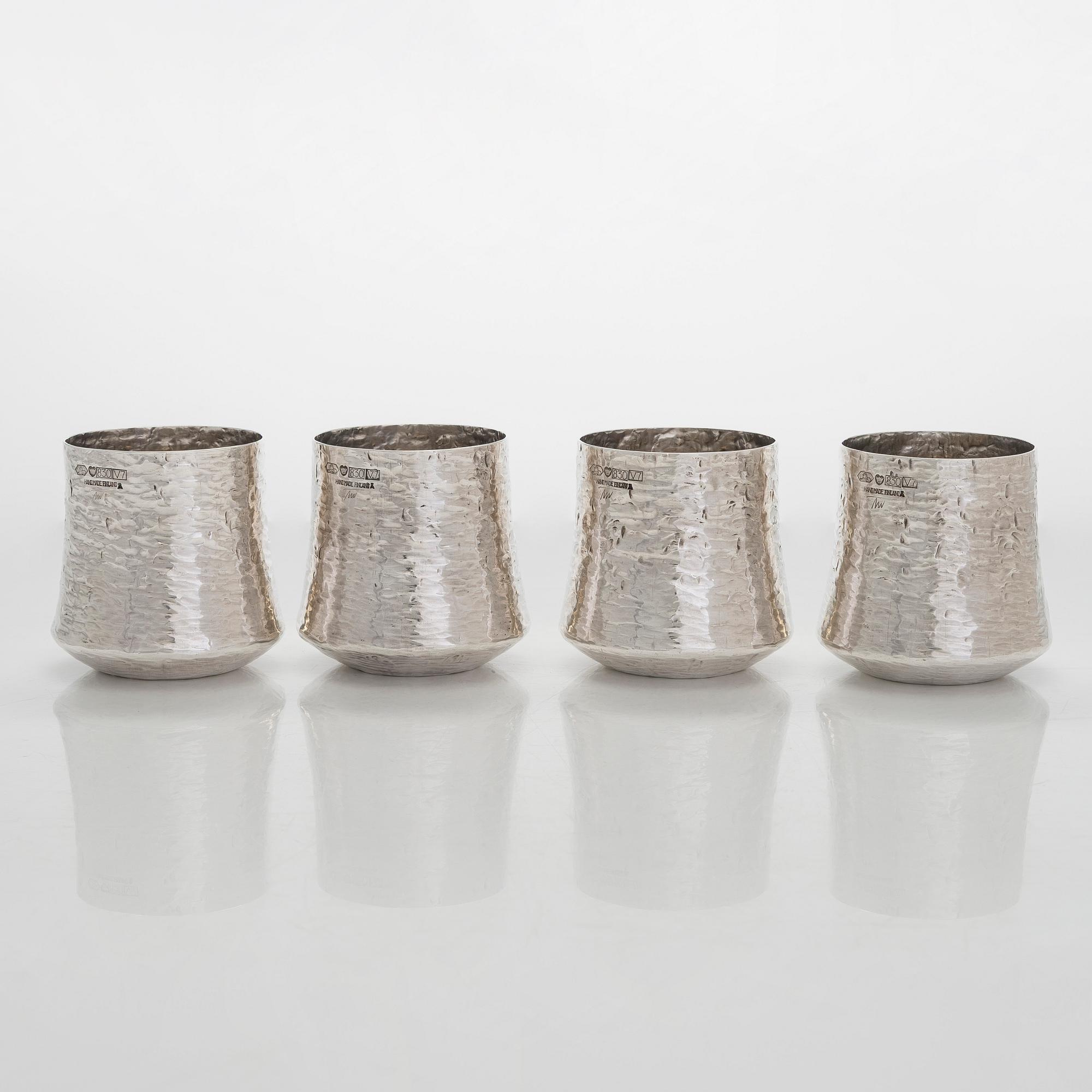 Tapio Wirkkala, four silver beakers, and a rosewood and sterling silver tray, Kultakeskus, Hämeenlinna 1973-74.