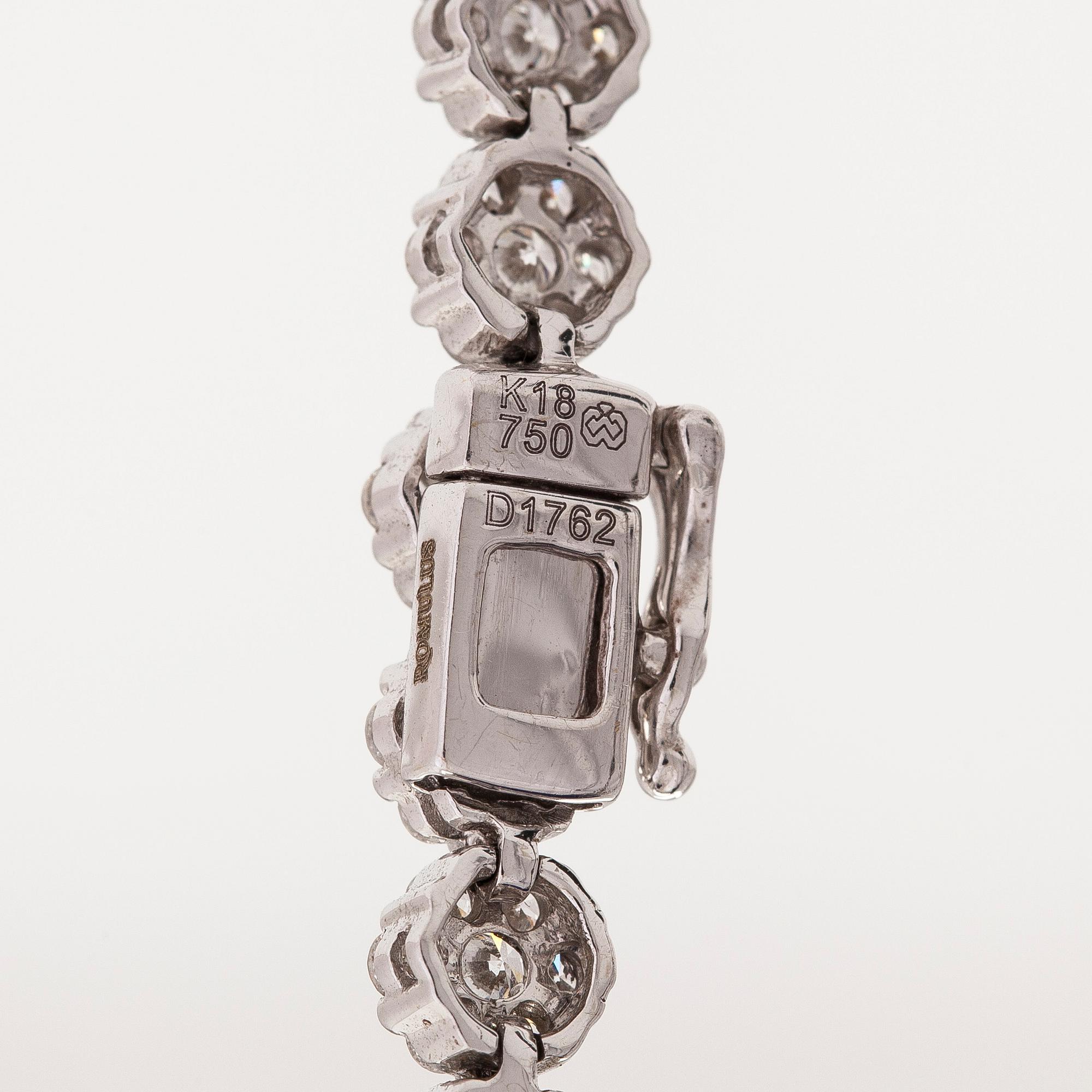 An 18K white gold necklace set with  diamonds totalling approx. 17.62 ct according to engraving. Foreign hallmarks.