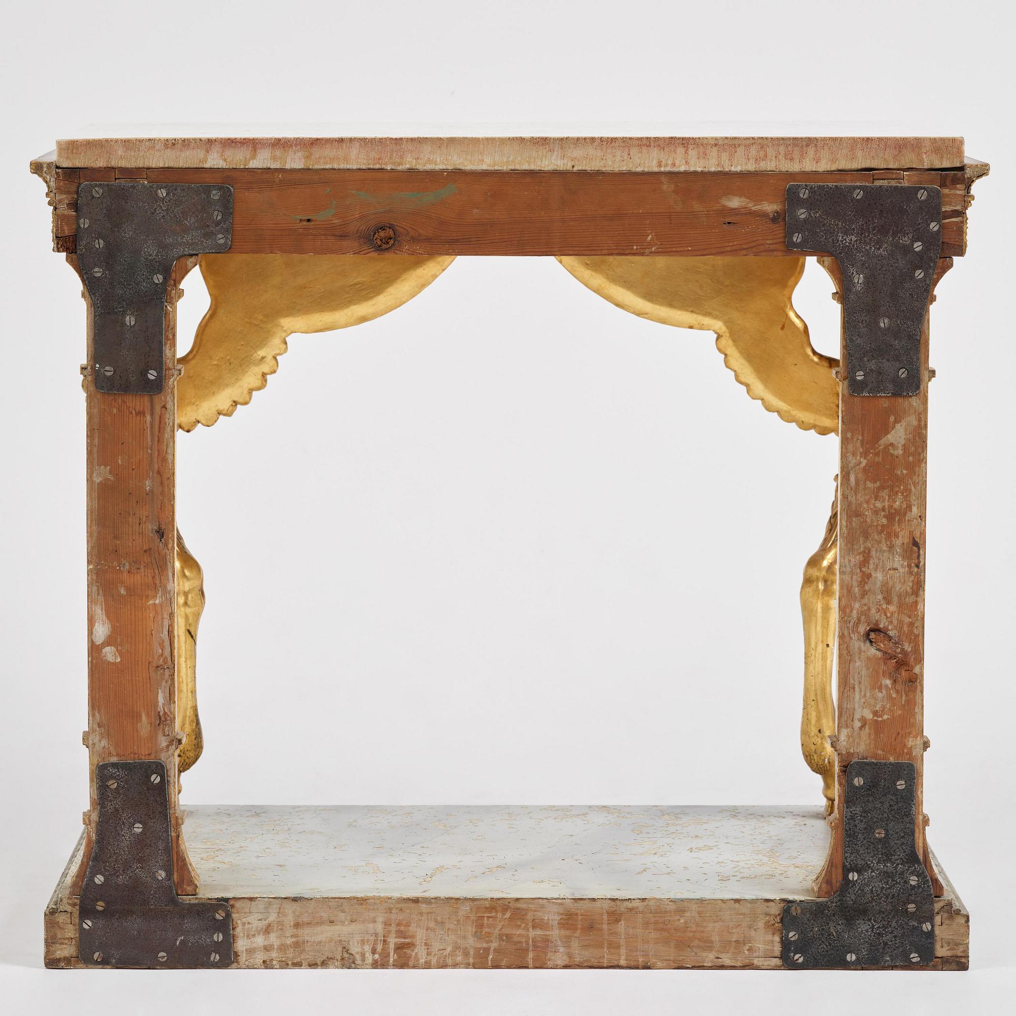 A late Gustavian giltwood console in the manner of J. Frisk, Stockholm, early 19th century.